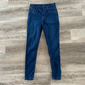 High waisted dark wash skinny jeans with contrast stitching